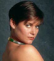 CAREY LOWELL as Anne Clayton